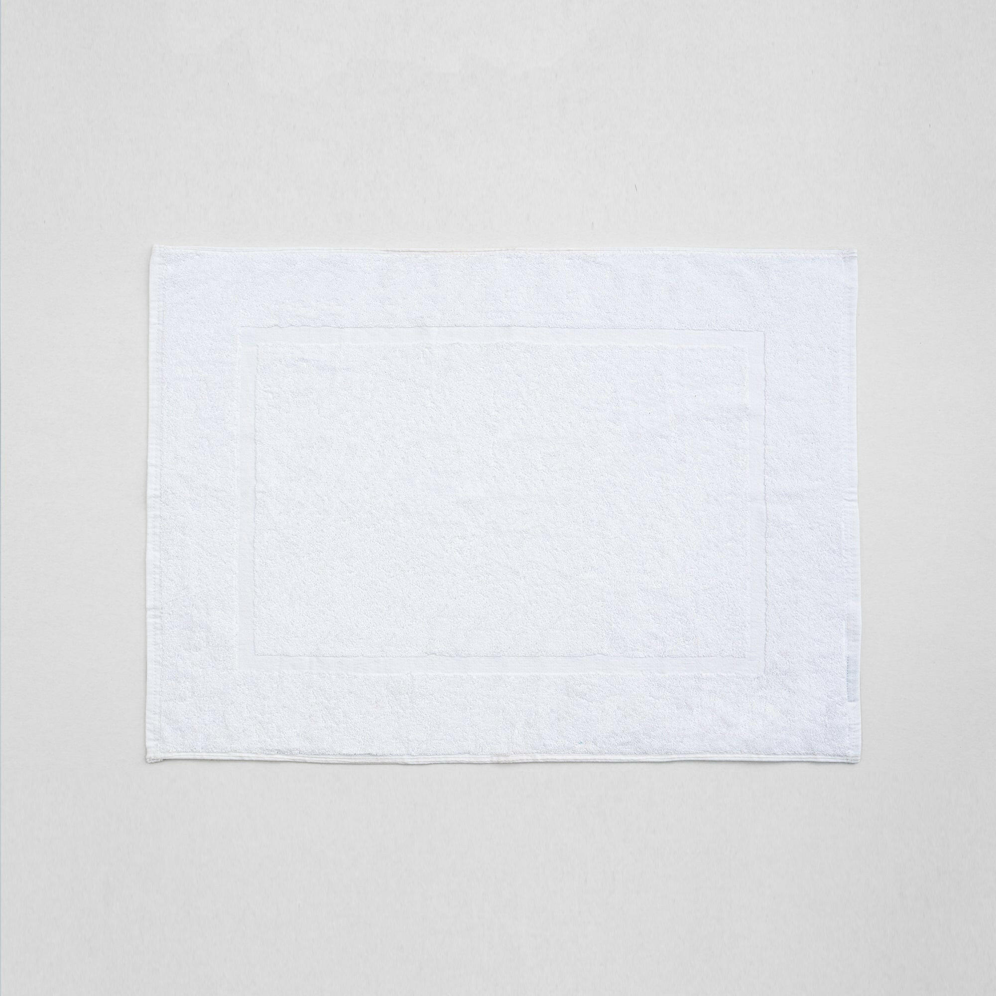 The Linen Company Bath Standard White Framed Bath Mat